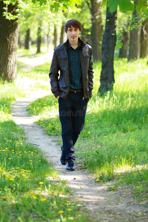 Young man walks stock image. Image of relaxing, rest - 30837333