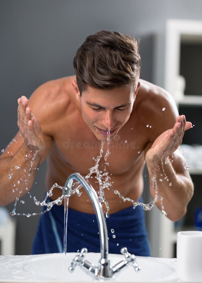Young Man Washing Face after Shaving Stock Photo Image of morning