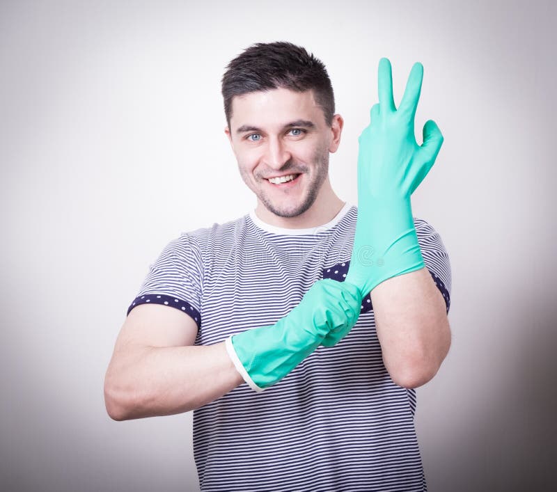 Cleaner Man Putting Gloves Stock Photos - Free & Royalty-Free Stock ...