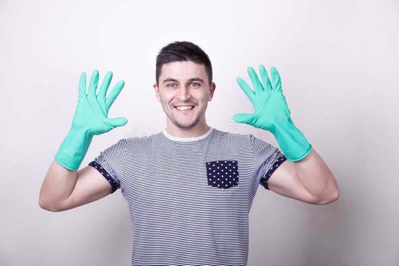 Cleaner Man Putting Gloves Stock Photos - Free & Royalty-Free Stock ...