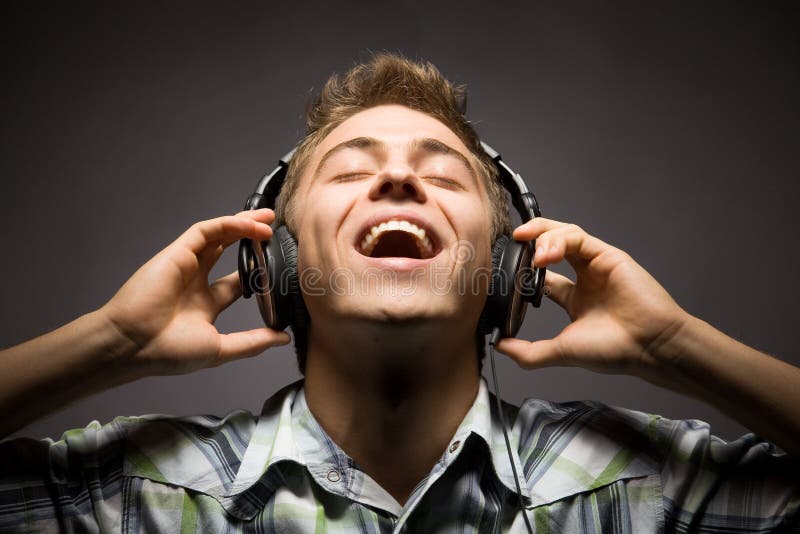 Young Man Wearing Headphones Stock Image Image of smile, caucasian 16608921