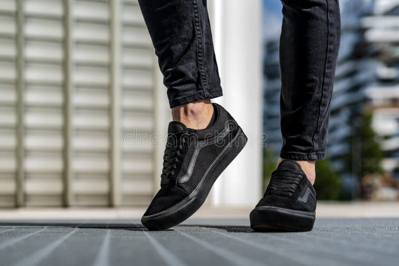 wearing vans old skool all black