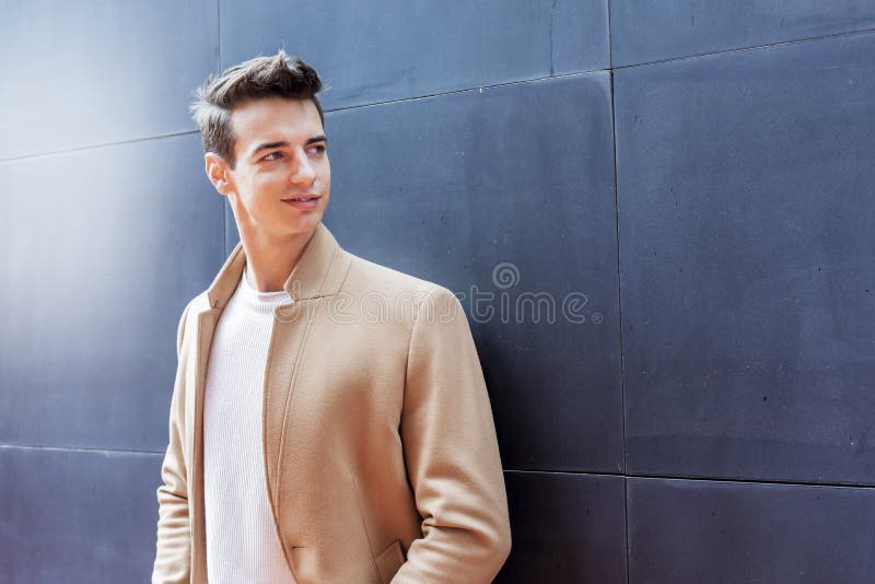 Premium Photo  Confident male businessman in casual business fashion jacket  walk in street having groomed beard and hairstyle confidence and charisma