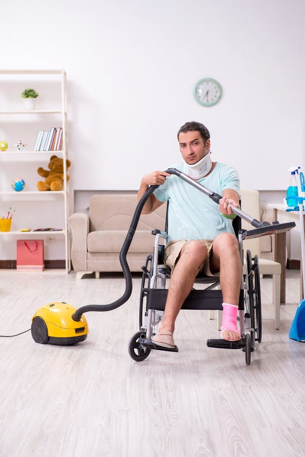 Young Man in Wheelchair Cleaning the House Stock Photo Image of