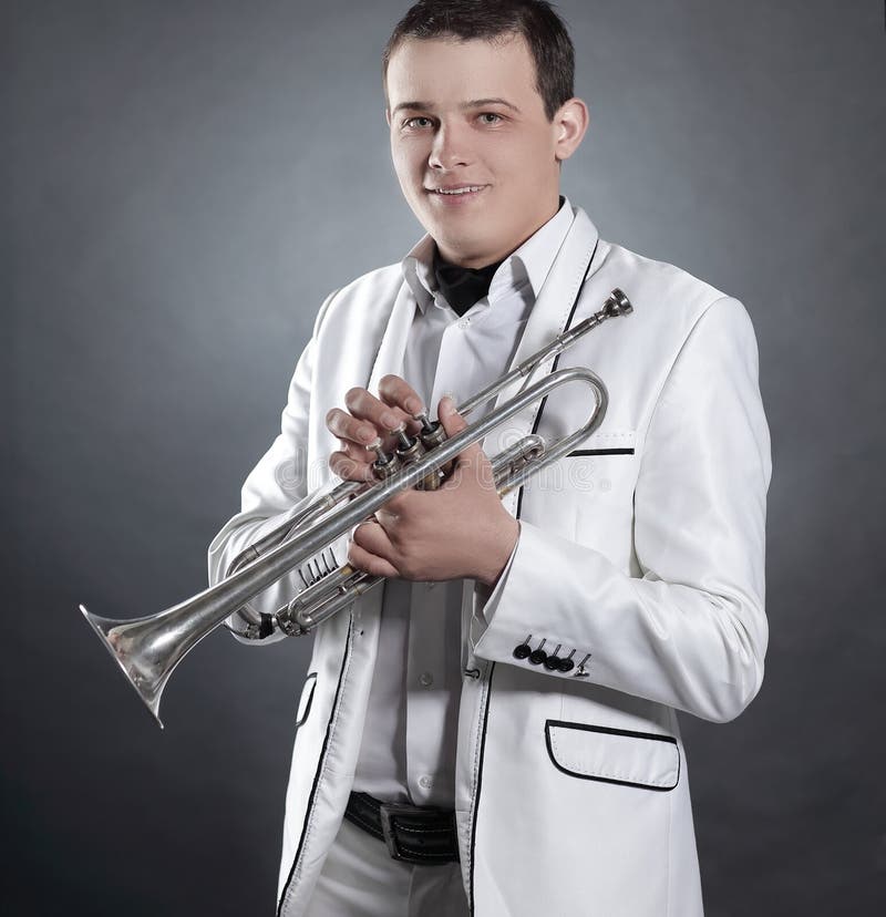 Man Playing Trumpet  Musician portraits, Pose reference, Trumpet