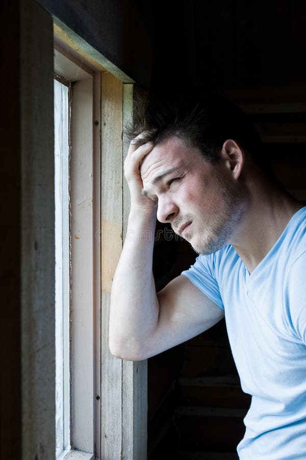 Young man at the window stock photo. Image of casual - 30207172