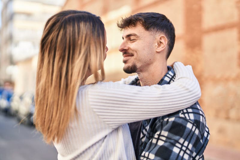 Young Man and Woman Couple Hugging Each Other Standing at Street Stock ...