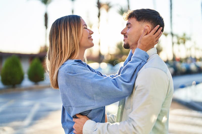 Young Man and Woman Couple Hugging Each Other Standing at Street Stock ...