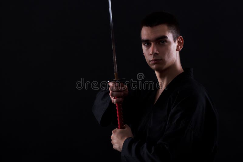 Young Martial Arts Fighter with Katana Stock Photo Image of steel