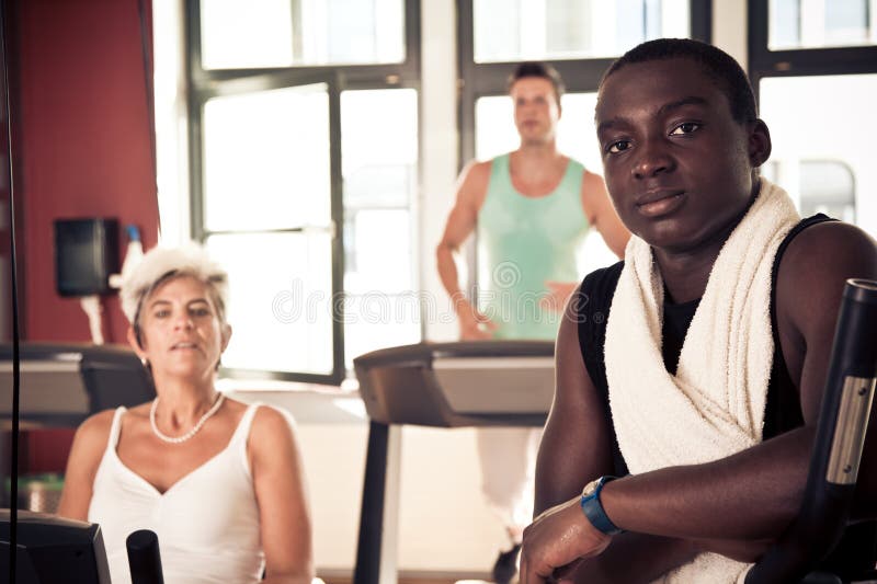 Young And Mature People At The Gym stock image Young And Mature People At The Gym stock image