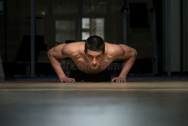 Young Men Doing Press Ups in Gym Stock Image Image of power, care