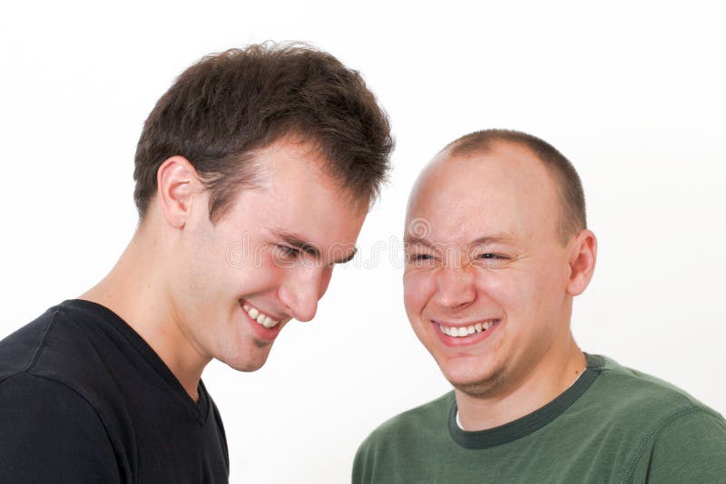 Young men goofing around laughing together