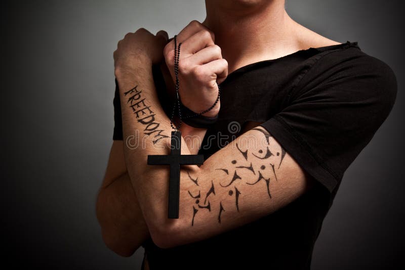 Young Man in Modern Black Clothing Holding Big Black Cross in Hands Stock Photo - Image of believe, background: 164845908 Young Man in Modern Black Clothing Holding Big Black Cross in Hands Stock Photo - Image of believe, background: 164845908