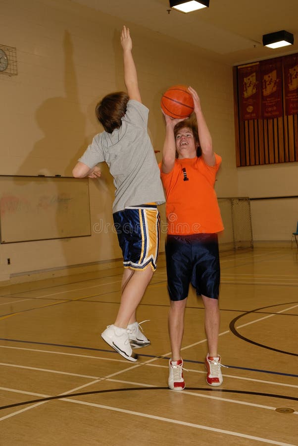 Young Men Playing Basketball 2 stock image