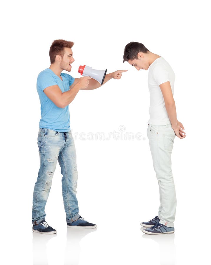 Young men screams to his friend through a megaphone royalty free stock photography Young men screams to his friend through a megaphone royalty free stock photography