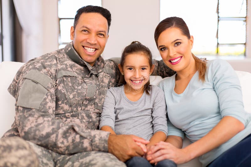 Young military family sitting