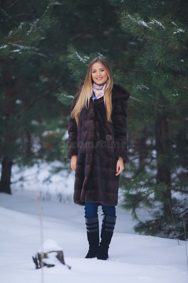 Young model girl walk in the winter forest. royalty free stock images Young model girl walk in the winter forest. royalty free stock images