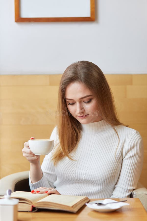 Woman sitting in front of teacup photo – Free Cup Image on Unsplash