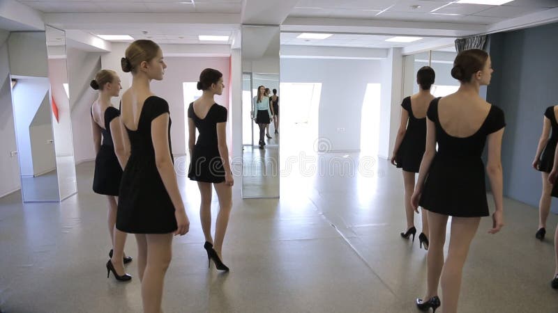 Young Models Make Rehearsal of Defile in Classroom Stock Video - Video of posing, dress: 77056319