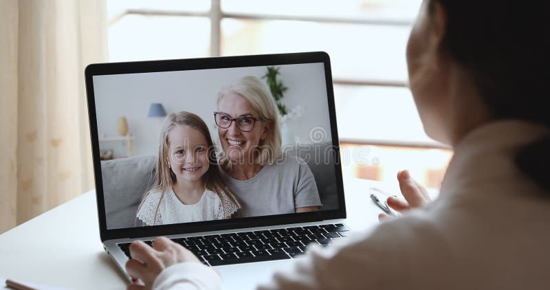 Young Mom Video Calling Child Daughter and Grandma by Webcam Stock Video - Video of communication, adult: 179023827