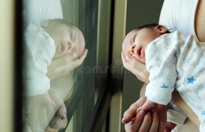 Young mother with her newborn baby