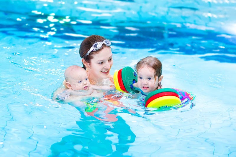 young mother playing kids swimming pool active her toddler daughter baby sister 41587901