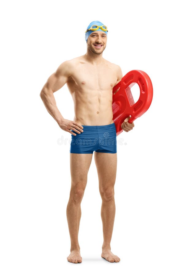 Young muscular man wearing swimming shorts and holding a swimming float royalty free stock photos Young muscular man wearing swimming shorts and holding a swimming float royalty free stock photos