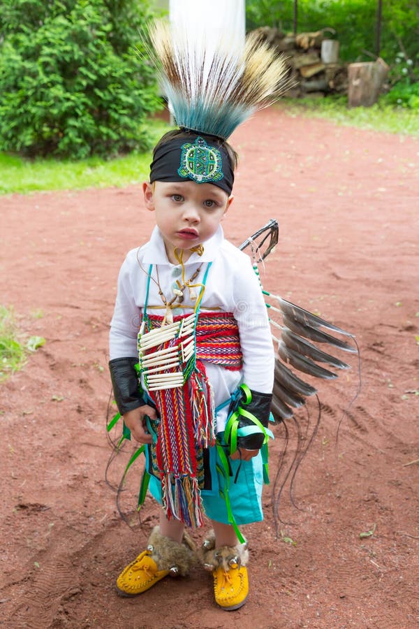 Red white and blue face paint, At the Pow Wow. Kids got the…