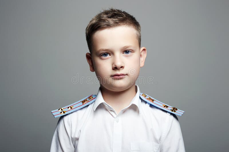 Young officer. handsom boy in uniform. Police child stock images Young officer. handsom boy in uniform. Police child stock images