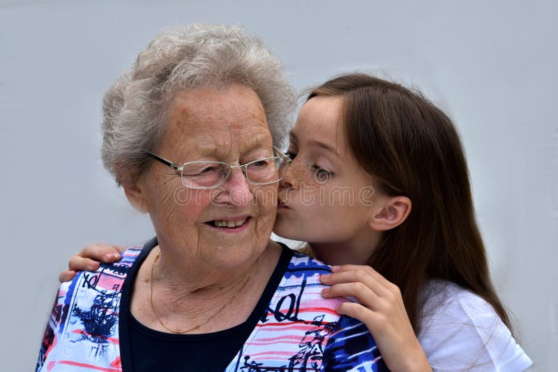 Me and grandma, girl kisses her granny