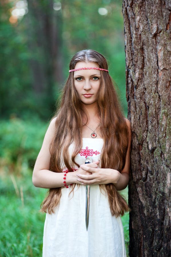 https://thumbs.dreamstime.com/b/young-pagan-slavic-girl-dagger-forest-64315685.jpg