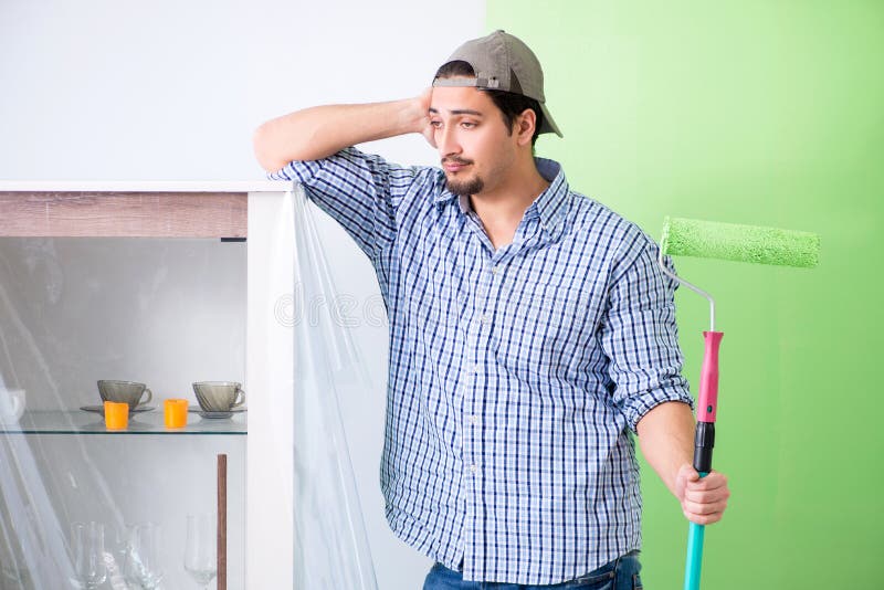 The Young Painter Doing Renovation at Home Stock Image Image of renewal, paint 131452771