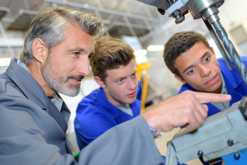 Young Painters Learning To Paint Stock Photo Image of machine