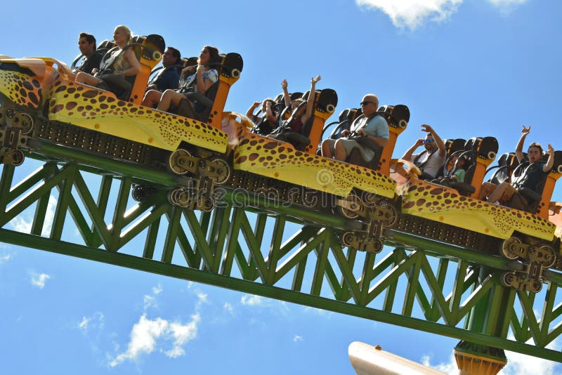 Young people on Cheetah Hunt Roller Coaster on Summer Holidays at Bush Gardens Theme Park. stock photos Young people on Cheetah Hunt Roller Coaster on Summer Holidays at Bush Gardens Theme Park. stock photos
