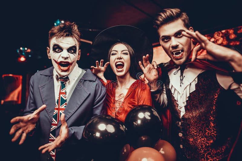 Young People in Costumes Celebrating Halloween Stock Image - Image of ...