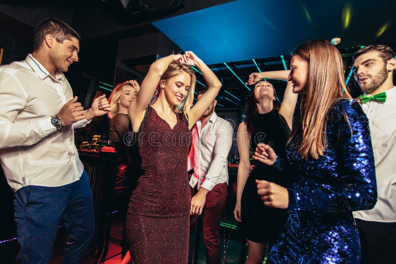 Young People Dancing in Night Club Stock Image - Image of light, group ...