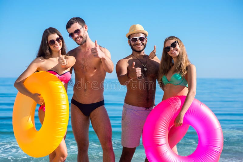 Young People Having Fun on the Beach. Stock Photo - Image of summer,  paradise: 63101602