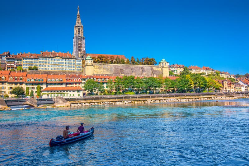 BERN, SWITZERLAND - September 25, 2016 - Young people kayaking on Aare river in the Bern city center. Bern is capital of Switzerland and fourth most populous city in Switzerland.