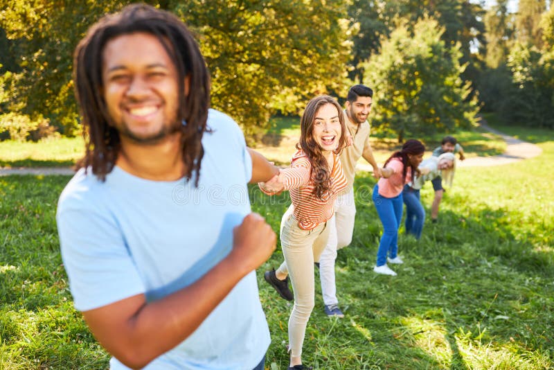 Young People Doing a Team Building Exercise in Summer Stock Image ...