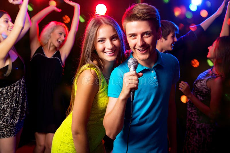 Young People Singing at Party Stock Photo - Image of adults, cheerful ...