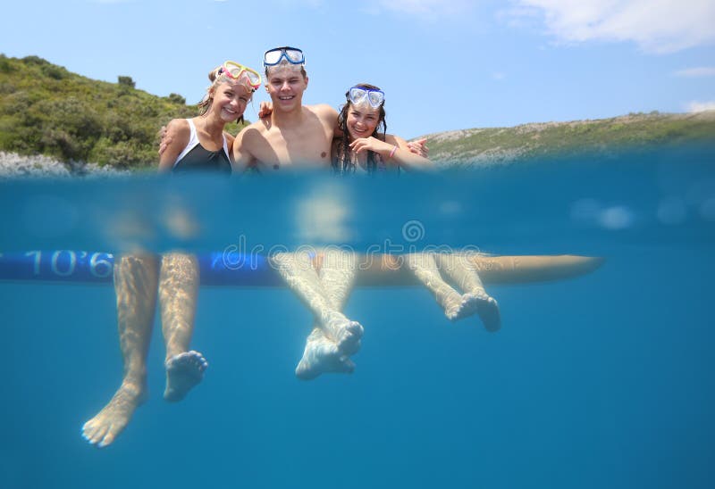 Sup surfing in the sea