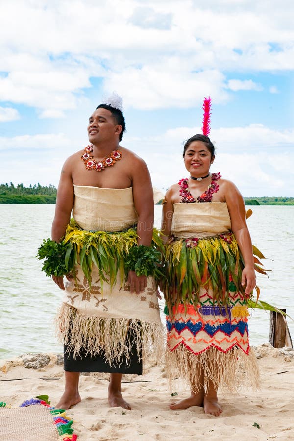 Couple dressed in typical Tongan style made from raffia and natrural material like leaves, Nukualofa, Tonga, South Pacific Island