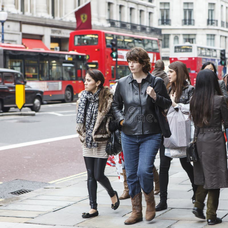 Young People Walk Along Oxford Street, the City`s Main Shopping Street ...