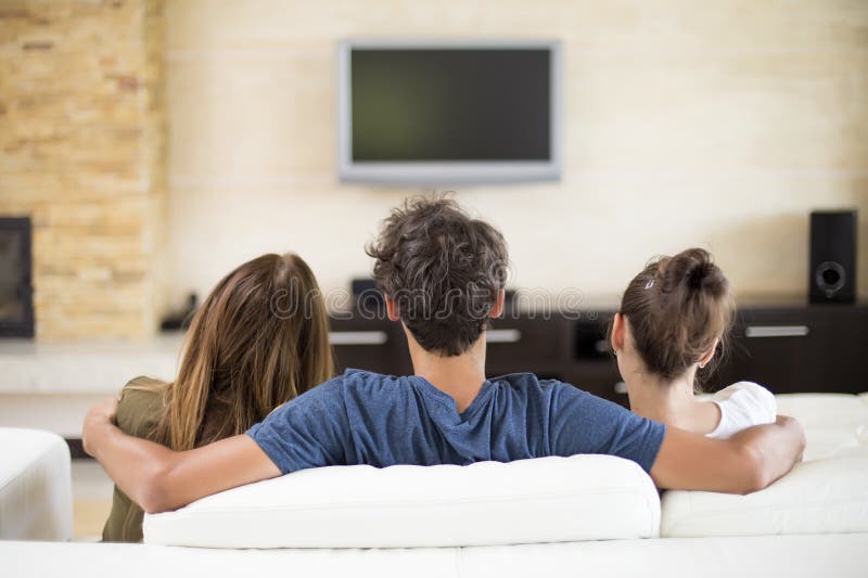 Young people watching tv  stock image Image of sitting 