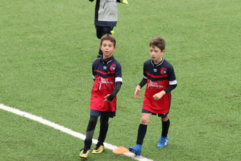 Young players play soccer editorial photography. Image of childhood