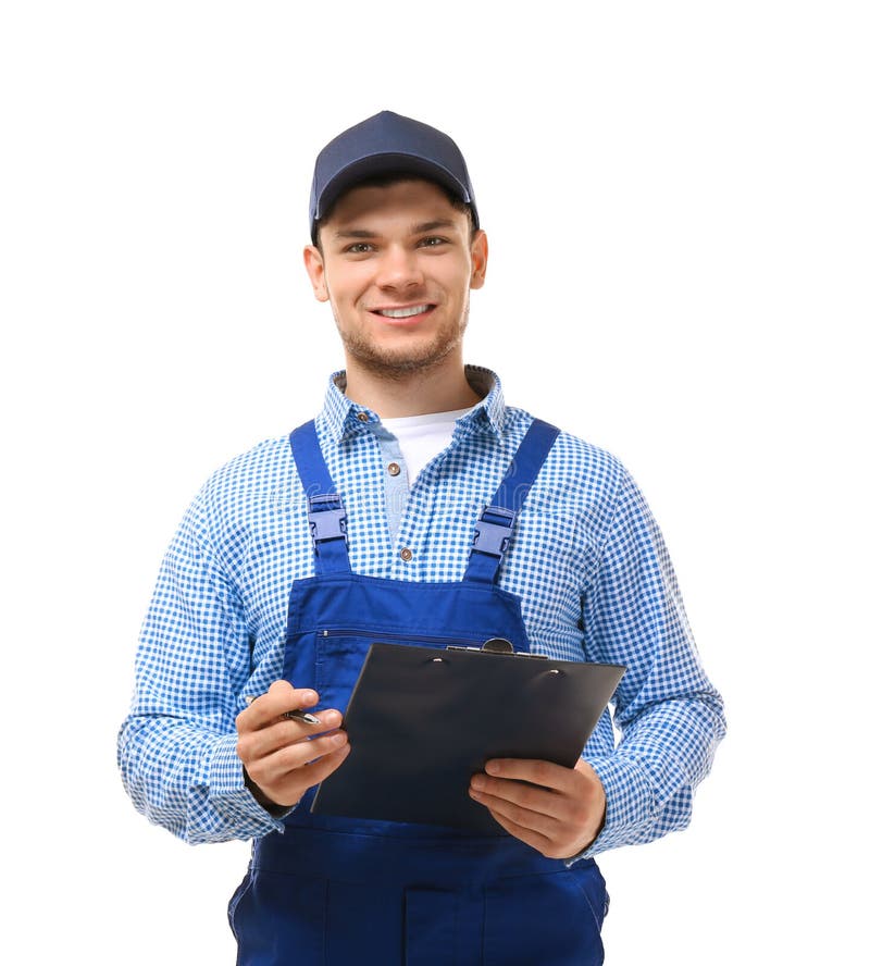 Young plumber in uniform holding clipboard stock image Young plumber in uniform holding clipboard stock image