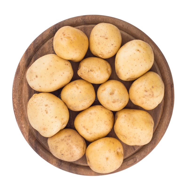 Young potatoes on a cutting board on white background close-up. stock photography Young potatoes on a cutting board on white background close-up. stock photography