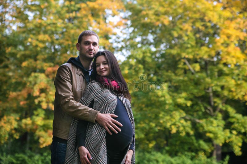 Young pregnant couple stock images