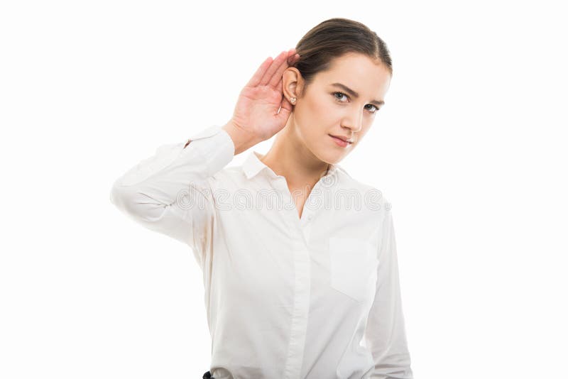 Young pretty business woman showing can`t hear you gesture royalty free stock photos Young pretty business woman showing can`t hear you gesture royalty free stock photos