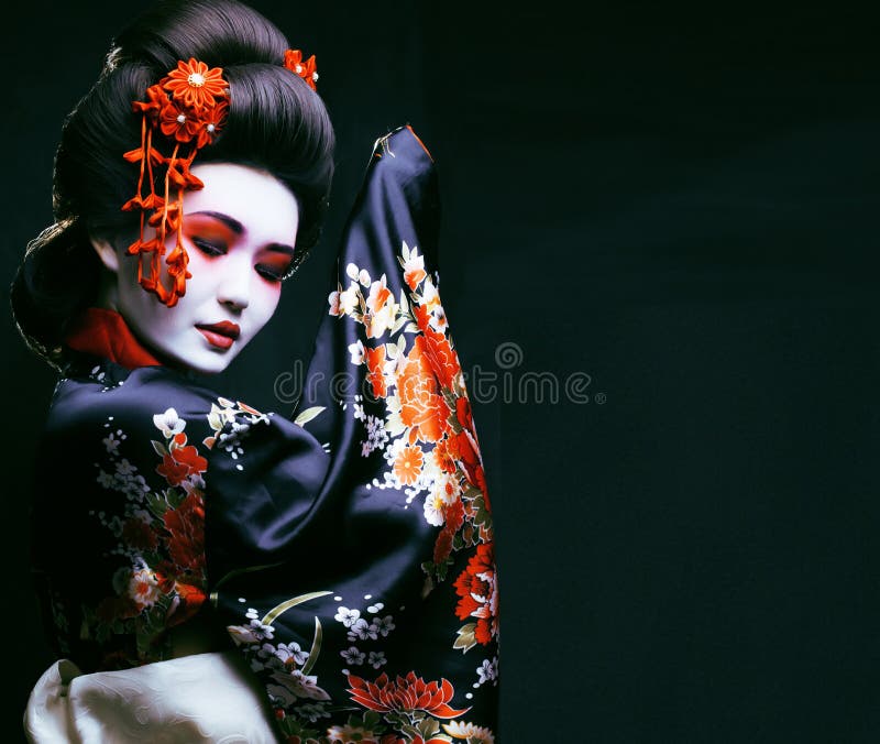 Young pretty geisha in kimono